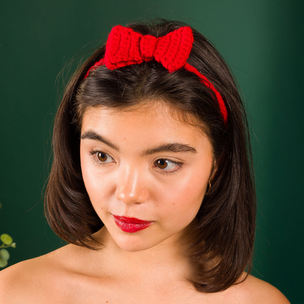 Crochet Sweetheart Bow Headband made using Red Heart yarn