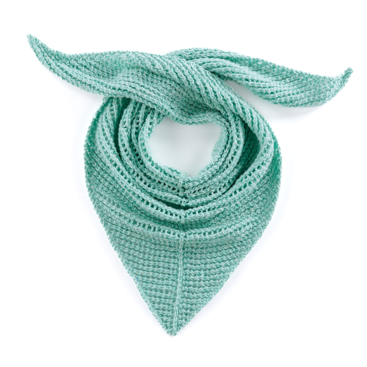 Cool Breeze Knit Shawl made using Red Heart yarn in a styled lifestyle setting