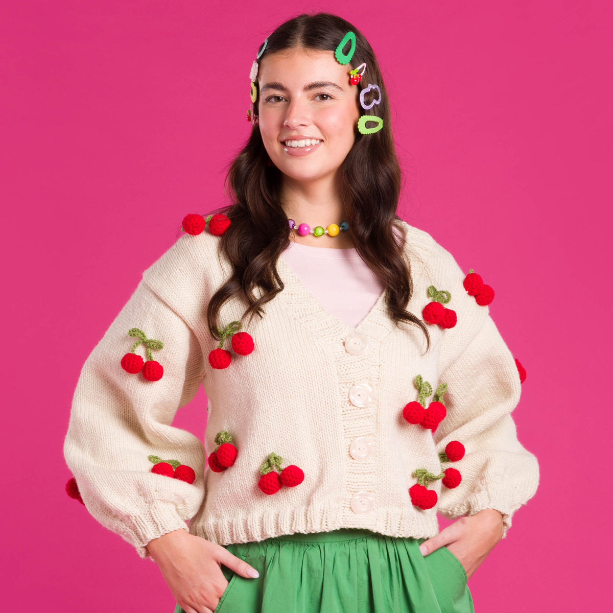 Knit Cardigan With Crochet Cherry made using Red Heart yarn