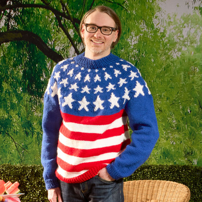 Red Heart Years of History Knit United Pullover Years Of History Knit United Pullover made using Red Heart yarn in a styled lifestyle setting