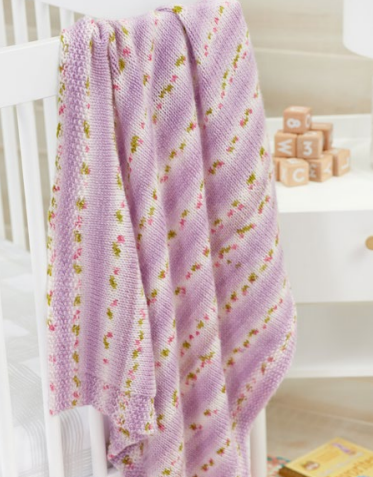 Precious Petals Knit Baby Blanket made using Red Heart yarn