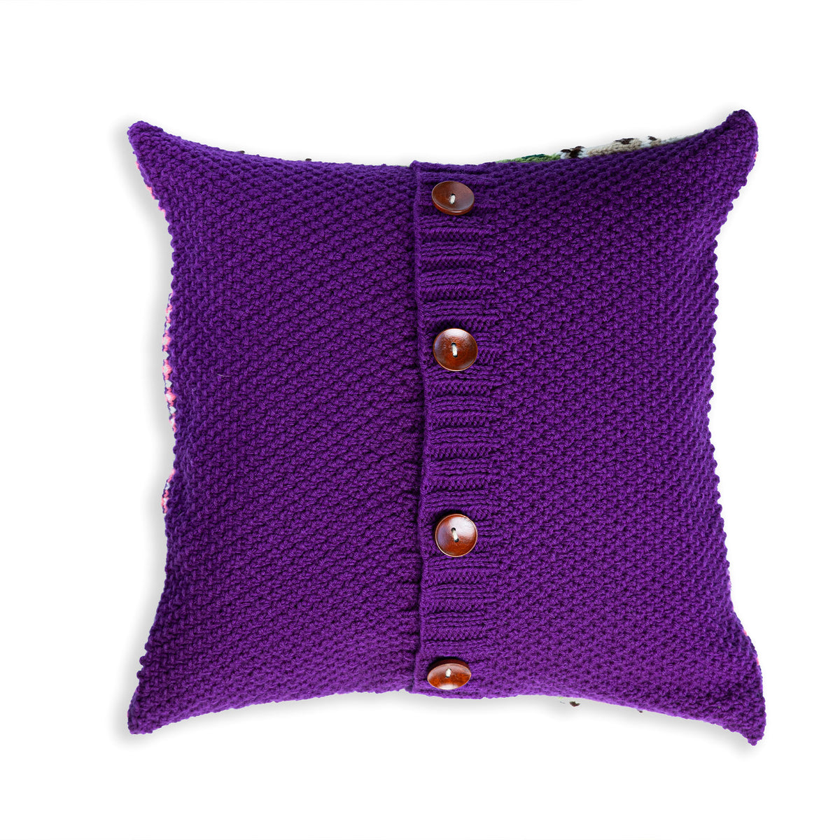 Cabbage Garden Knit Pillow made using Red Heart yarn in a styled lifestyle setting