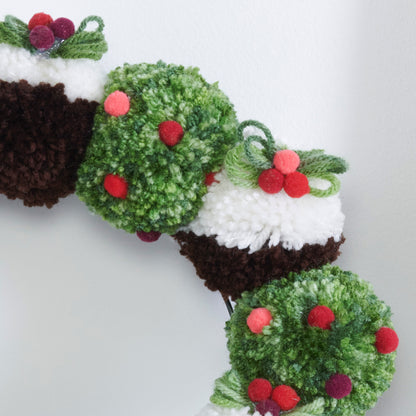 Red Heart Craft Christmas Pudding Pom Pom Wreath Craft Wreath made in Red Heart Super Saver Yarn