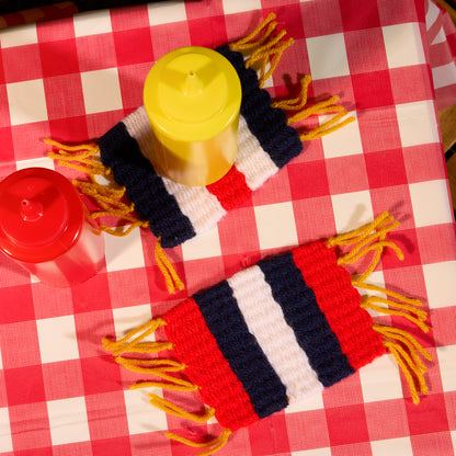 Red Heart Red White and Blue Woven Coasters Red White And Blue Woven Coasters made using Red Heart yarn in a styled lifestyle setting