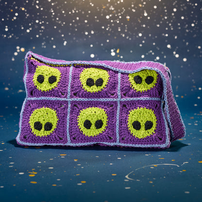 Lily Sugar'n Cream Crochet Extraterrestrial Messenger Bag Crochet Extraterrestrial Messenger Bag made using Lily yarn in a styled lifestyle setting