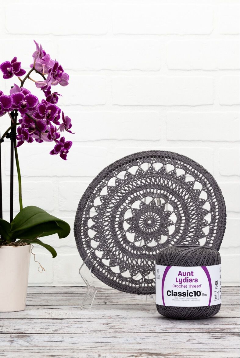 Gray mandala pattern with thread