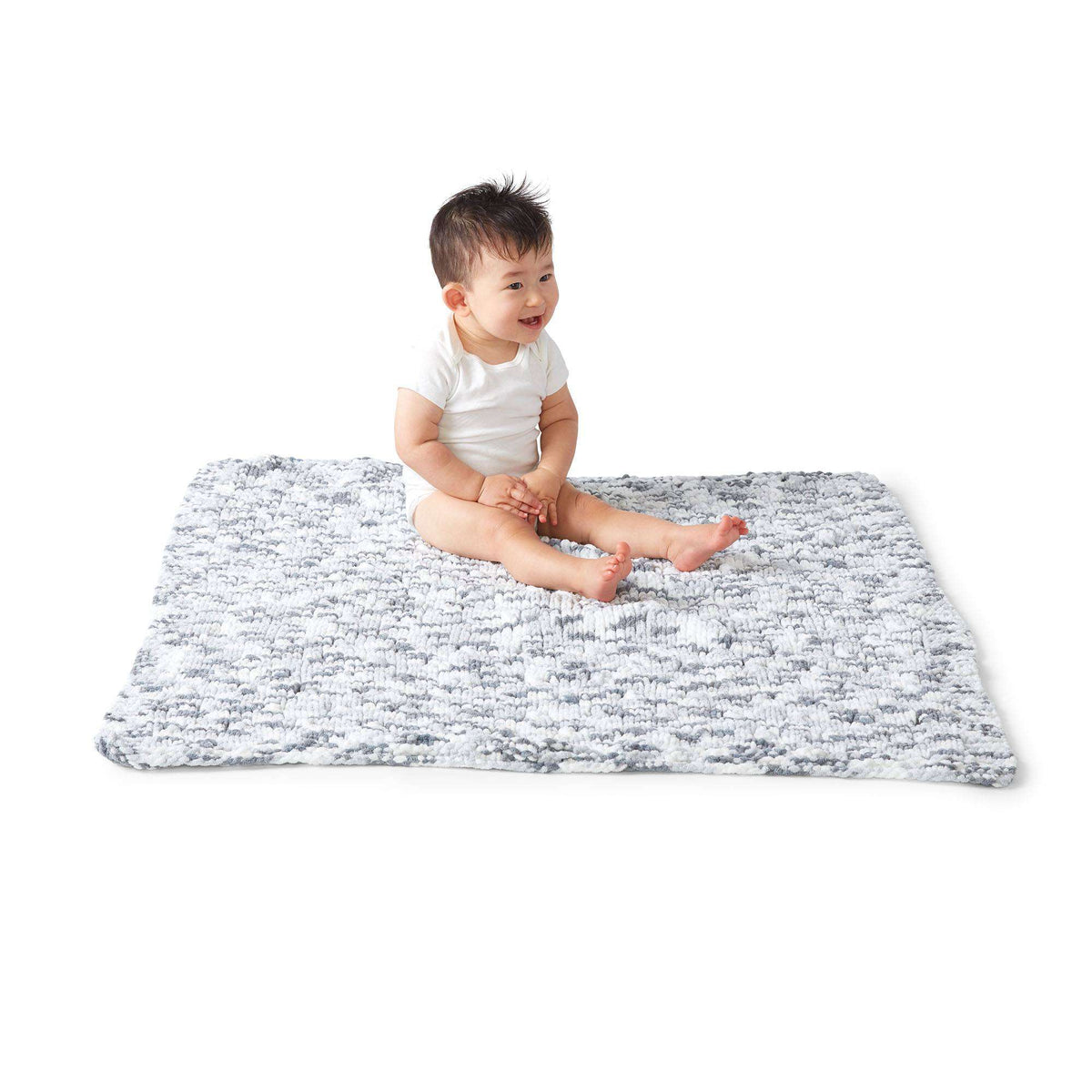 Knit Blanket made in Bernat Baby Blanket yarn