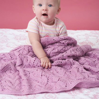 Bernat Cable and Lace Knit Blanket Knit Blanket made in Bernat Baby Sport yarn