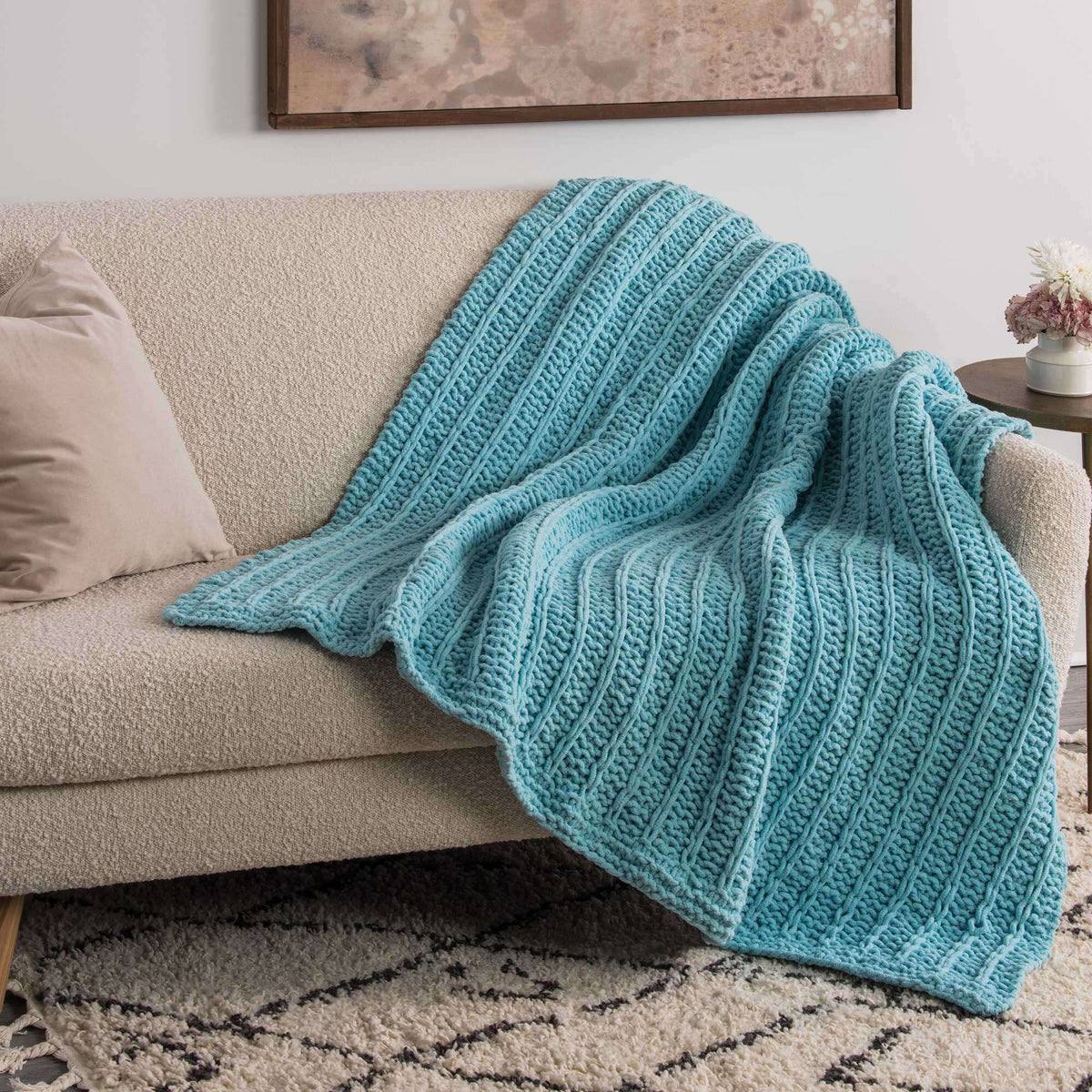Knit Blanket made in Bernat Blanket Sparkle yarn