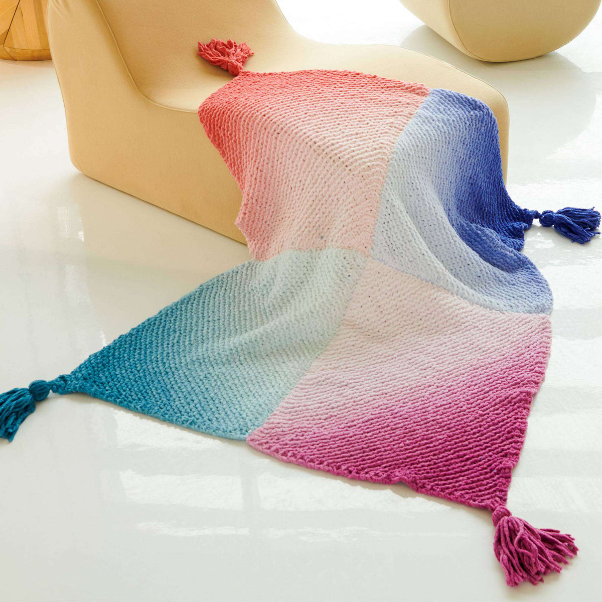 Knit Blanket made in Bernat Blanket Perfect Phasing Yarn