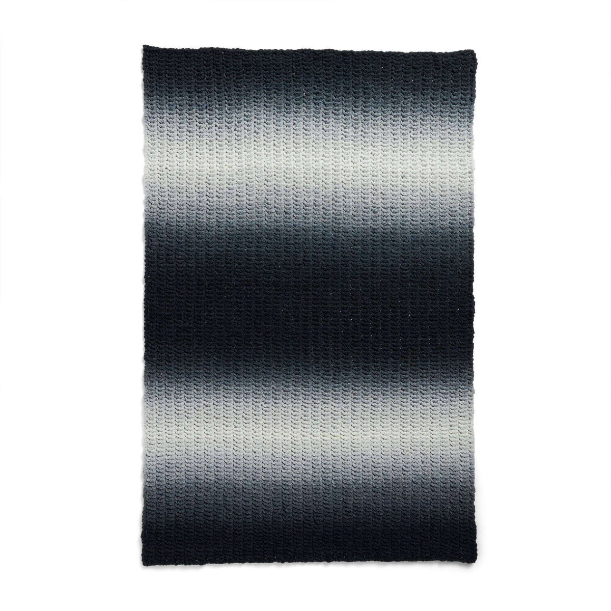 Knit Blanket made in Bernat Blanket Perfect Phasing yarn