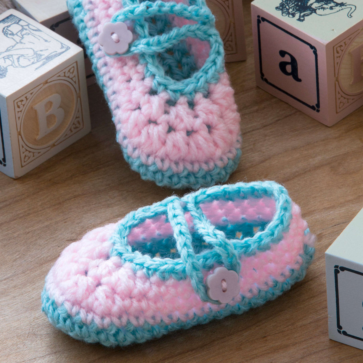 Crochet Booties made in Red Heart Baby Hugs Light Yarn