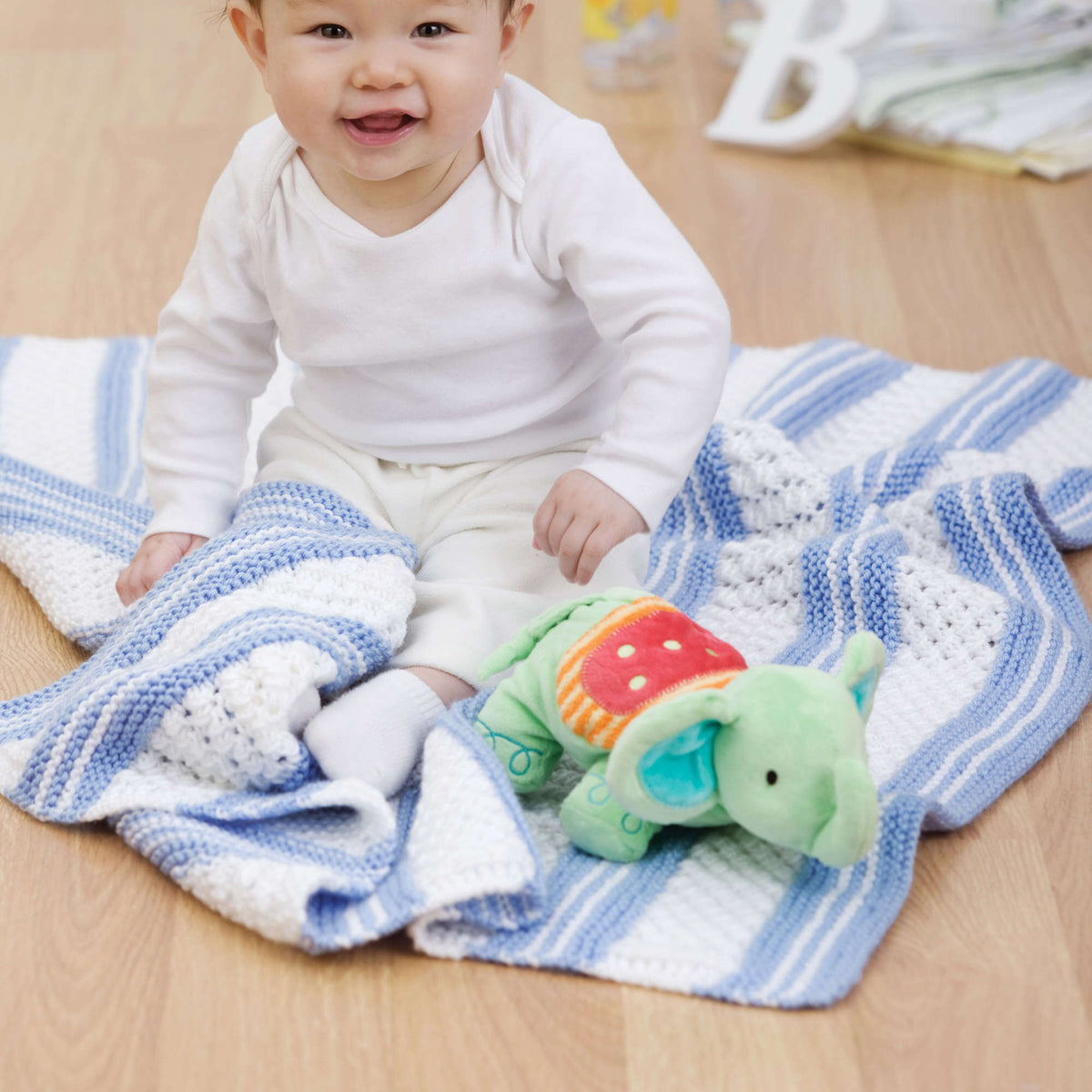 Knit Blanket made in Red Heart Soft Baby Steps Yarn