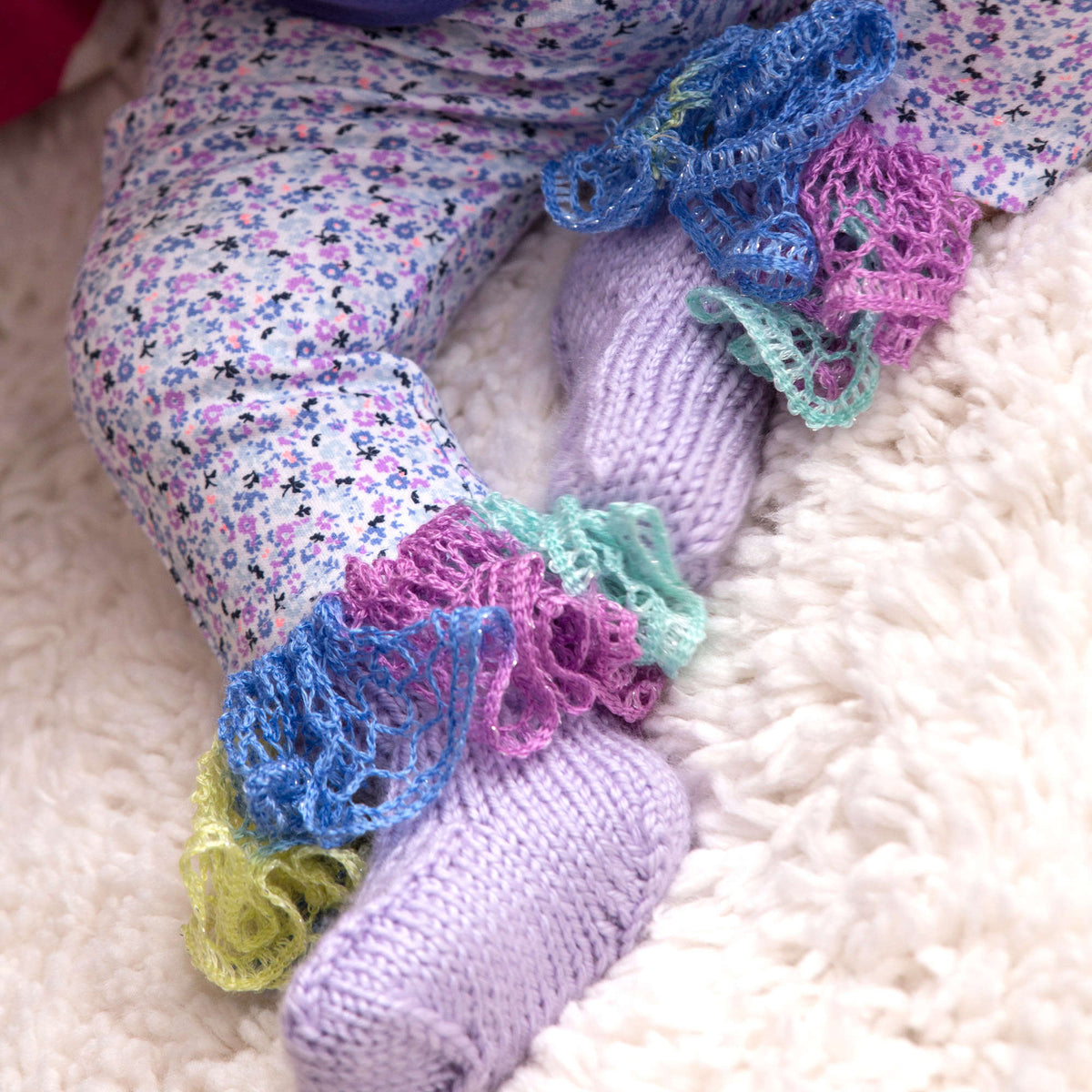 Knit Booties made in Red Heart Soft Baby Steps Yarn