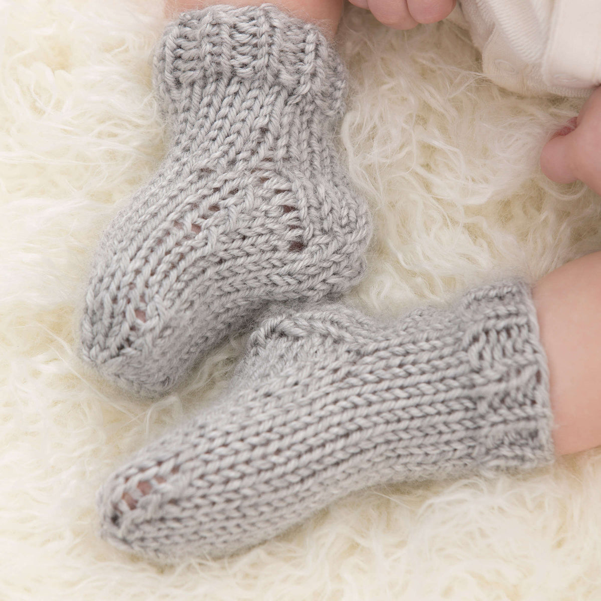 Knit Socks made in Red Heart Soft Baby Steps Yarn