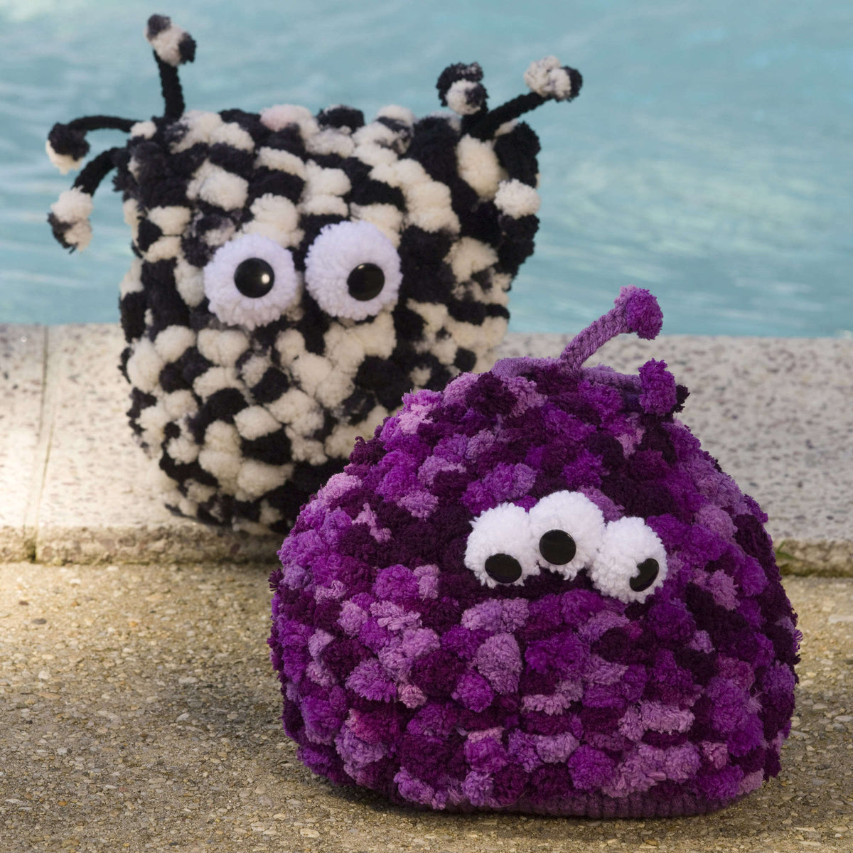 Knit Pillows made in Red Heart Pomp-a-Doodle Yarn
