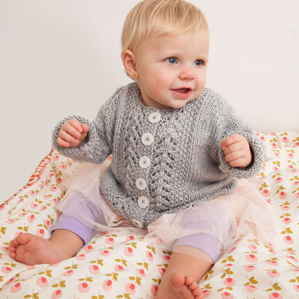 Knit Cardigan made in Red Heart Soft Baby Steps Yarn