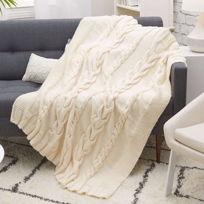 Red Heart Luxurious Cabled Throw Knit Throw made in Red Heart Soft Essentials Yarn