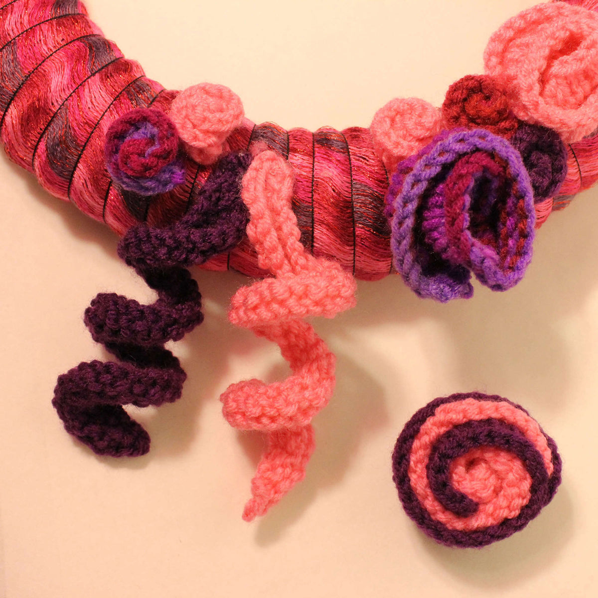 Knit Wreath made in Red Heart Boutique Yarn