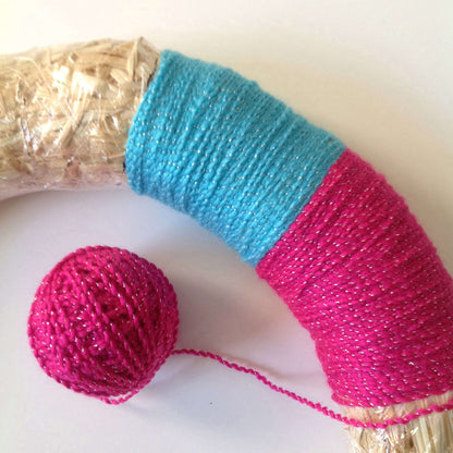 Red Heart Craft Rainbow of Colors Wreath Craft Wreath made in Red Heart Celebration Yarn