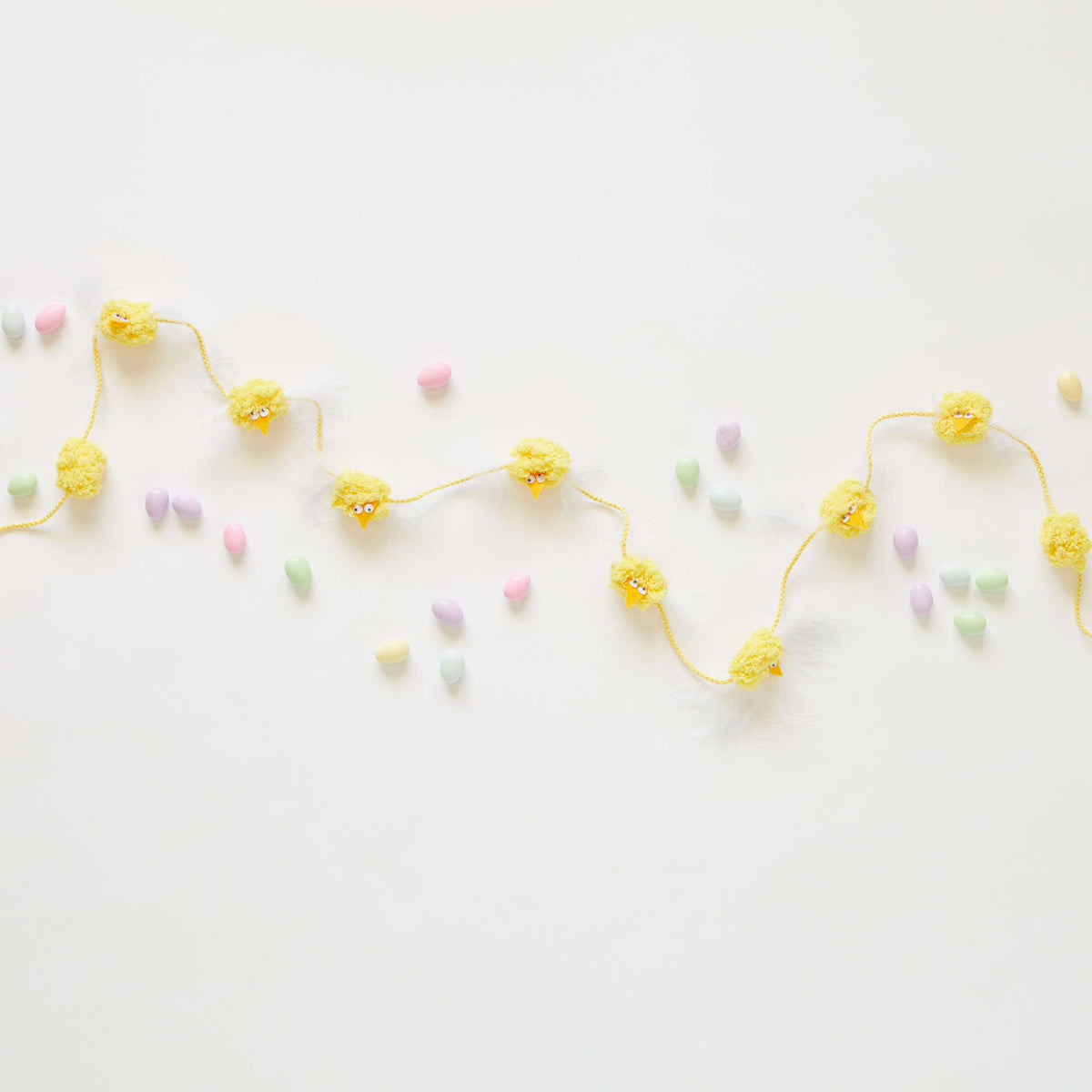 Craft Garland made in Red Heart Pomp-a-Doodle Yarn